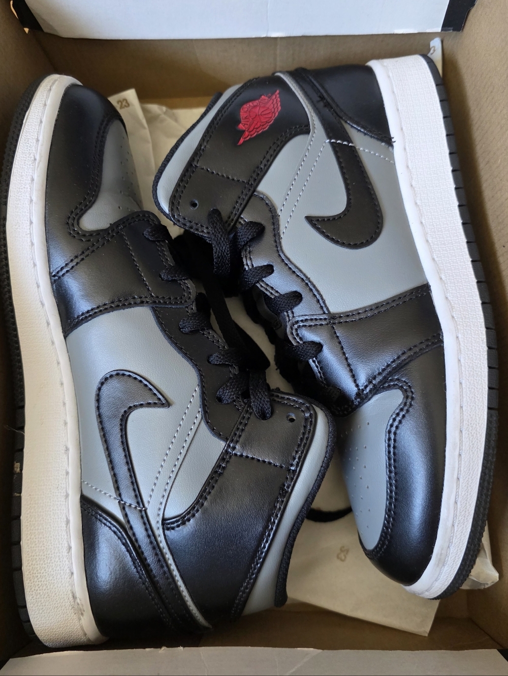 Jordan Retro High-Top Sneakers in Black, Gray and White with Red Wings Logo